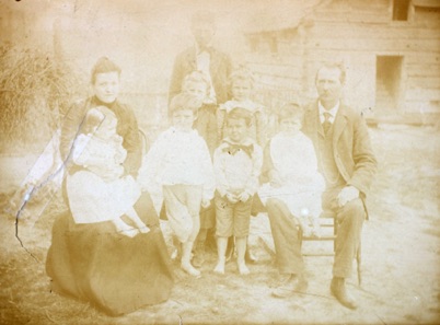 Napoleon Fultz family: Wilmoth (Holler) seated with Frenchy Catherine, Joseph Earl in back, Irene, Lucy, Lee and Dewey standing center, and Napoleon seated with Roy. c. 1903, Shenandoah County, Virginia.